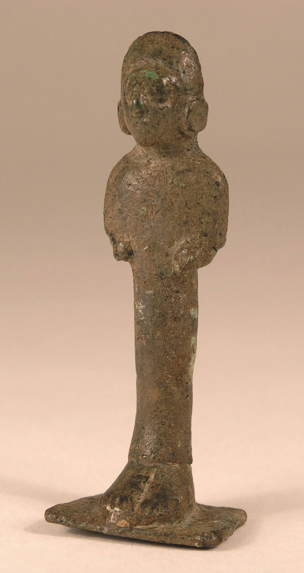 Statue of Man with Headdress and Earrings